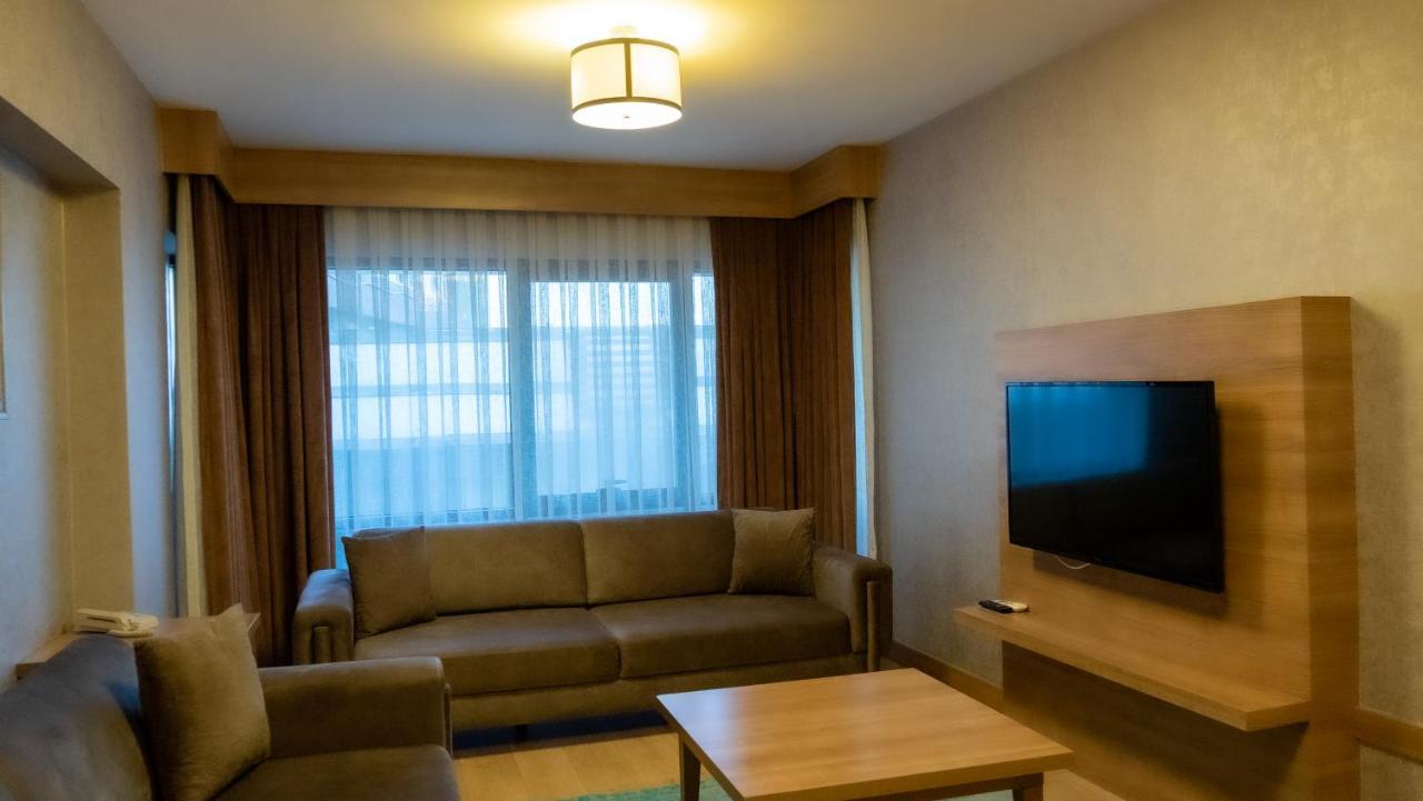 Bursa Suites Apart Otel Extérieur photo Living room of a suite at the hotel