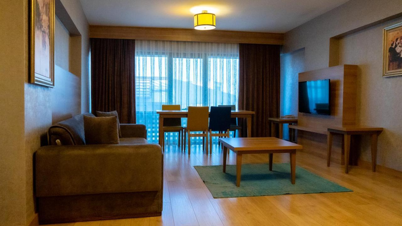 Bursa Suites Apart Otel Extérieur photo A living room in a hotel