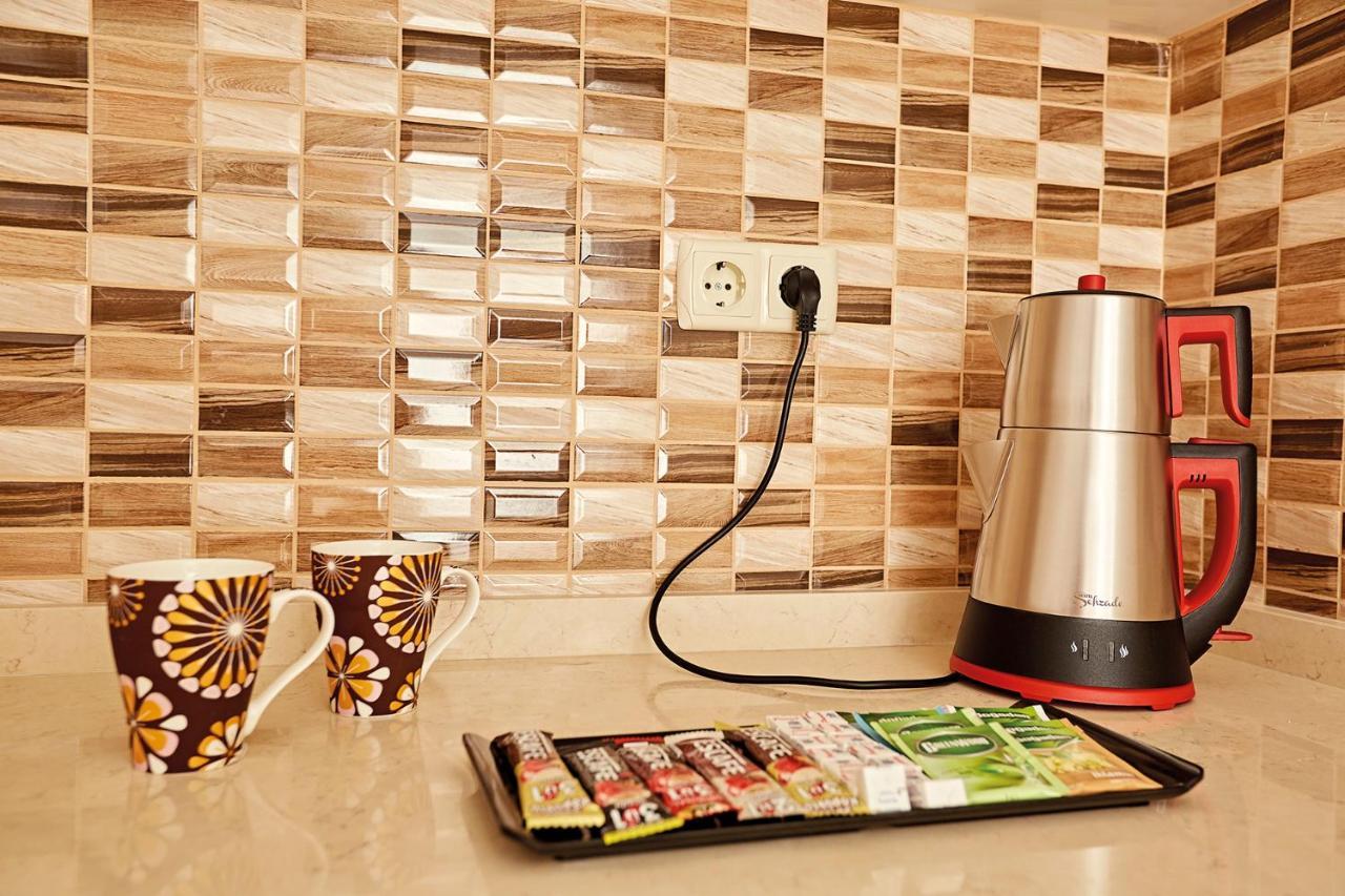 Bursa Suites Apart Otel Extérieur photo A kettle plugged into a wall socket